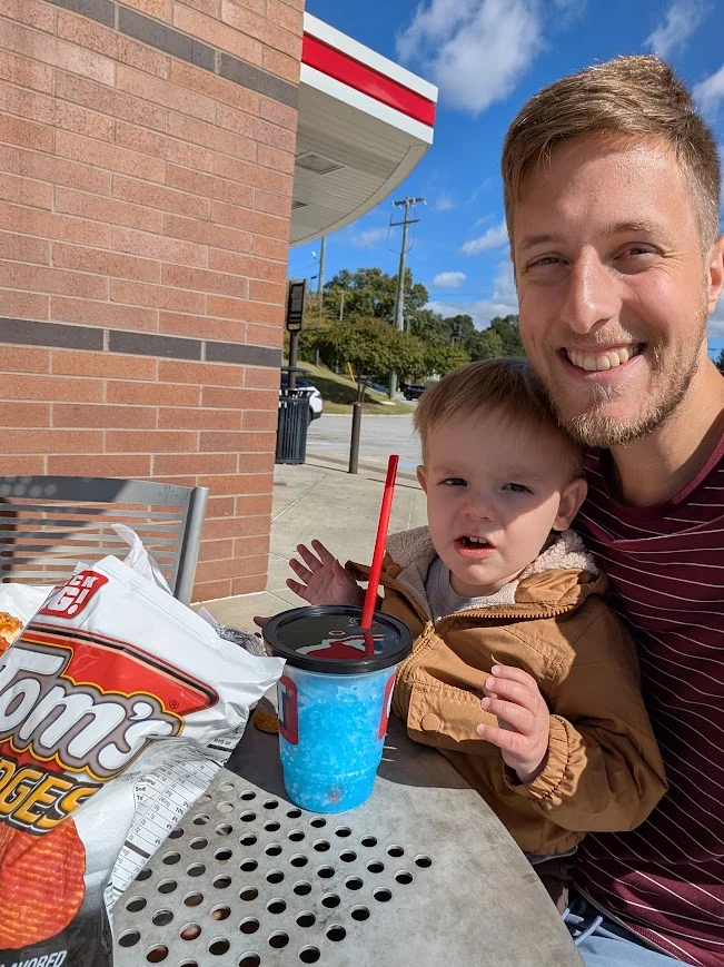 What a busy day! House errands, early Christmas shopping for the youngest's gifts to the rest of the fam, and a baby shower for my sister. Packed but good altogether. This picture is from a little lunch break amidst errands while wife and oldest were at home.